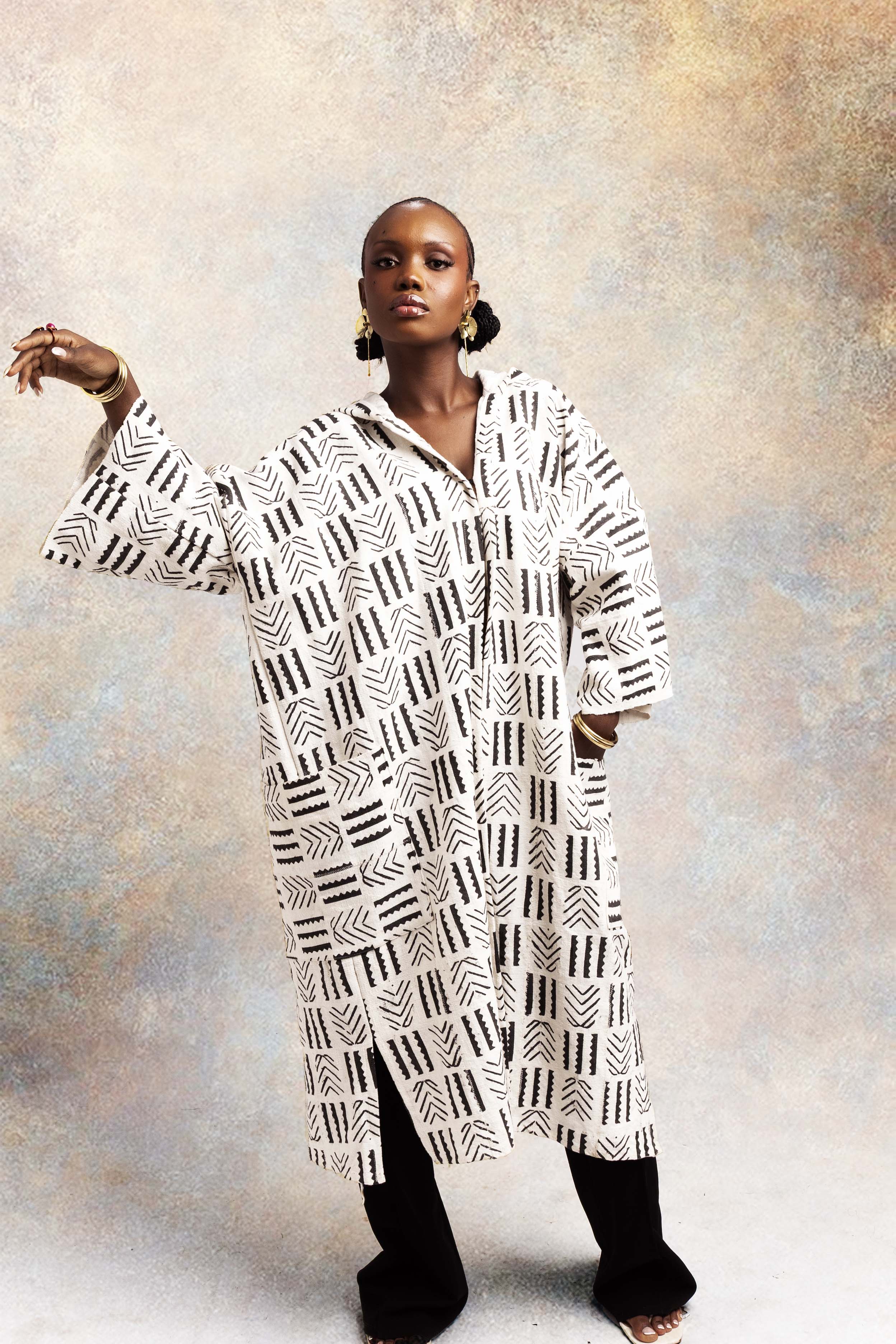 Mantello Bogolan con cappuccio Brick Road (preordine)